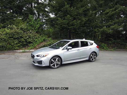 2017 ice silver Subaru Impreza Sport 5 door hatchback. 18" machined alloys, LED daytime running lights, silver door handles, body colored mirrors with turn signals