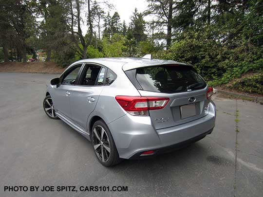 2017 ice silver Subaru Impreza Sport 5 door hatchback. 18" machined alloys, LED daytime running lights, silver door handles, body colored mirrors with turn signals. No roof rack rails