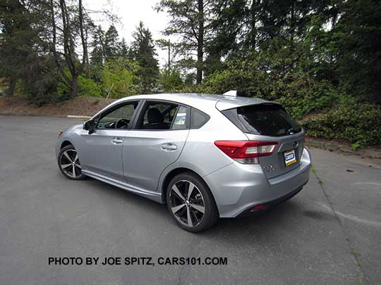 2017 ice silver Subaru Impreza Sport 5 door hatchback. 18" machined alloys, LED daytime running lights, silver door handles, body colored mirrors with turn signals. No roof rack rails