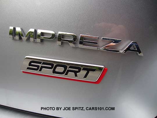 closeup of the 2017 Impreza Sport logo, 5 door hatchback rear gate, ice silver car shown