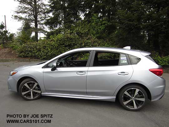2017 ice silver Subaru Impreza Sport 5 door hatchback. 18" machined alloys, LED daytime running lights, silver door handles, body colored mirrors with turn signals. No roof rack rails