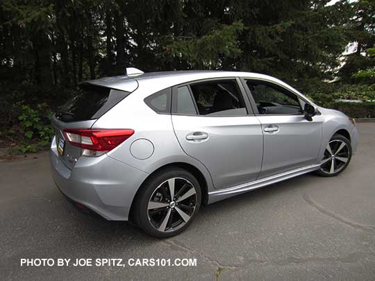 2017 ice silver Subaru Impreza Sport 5 door hatchback. 18" machined alloys, LED daytime running lights, silver door handles, body colored mirrors with turn signals. No roof rack rails