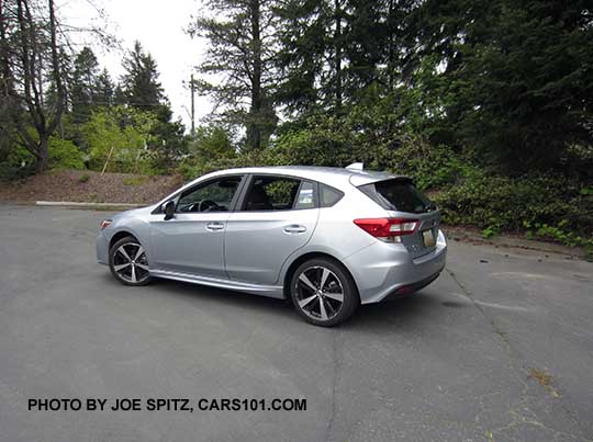 2017 ice silver Subaru Impreza Sport 5 door hatchback. 18" machined alloys, LED daytime running lights, silver door handles, body colored mirrors with turn signals. No roof rack rails