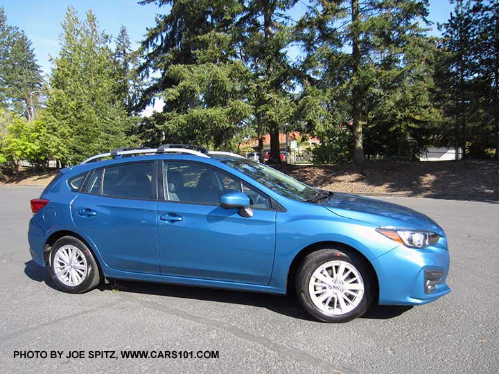 2017 Subaru Impreza Premium 5 door hatchack, island blue color. Silver 16" alloys, silver roof rack rails, body colored door handles and mirrors. Optional roof rack crossbars