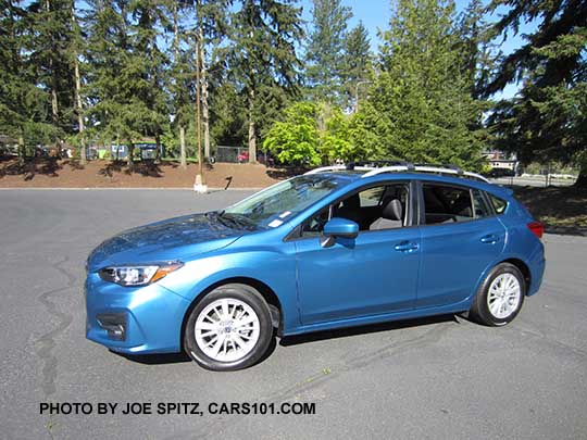 2017 Subaru Impreza Premium 5door hatchback, Island Blue color. 16" silver alloys, silver roof rack rails, body colored mirrors and door handles. With optional aero crossbars