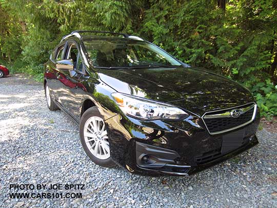 crystal black 2017 Subaru Impreza Premium 5 door hatchback has silver roof rails. No fog lights (optional)