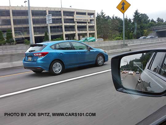 Island Blue color 2017 Subaru Impreza 2.0i 5 door seen on the freeway, June 2017