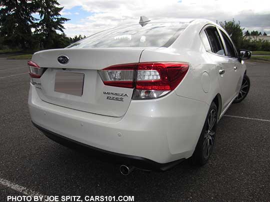 2017 Subaru Impreza 4 door sedan, rear view, crystal white Limited model shown