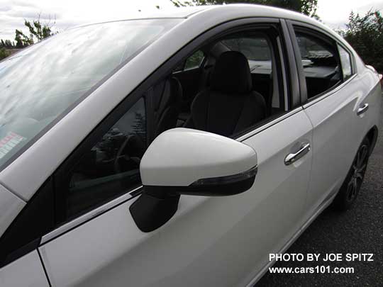 2017 Subaru Impreza Limited body colored outside mirror with turn signal, and chrome lower window trim and door handles