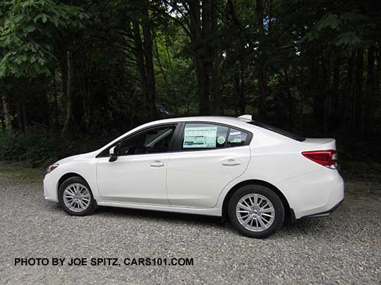 2017 Subaru Impreza Premium 4 door sedan with silver 16" alloys, body colored mirrors and door handles