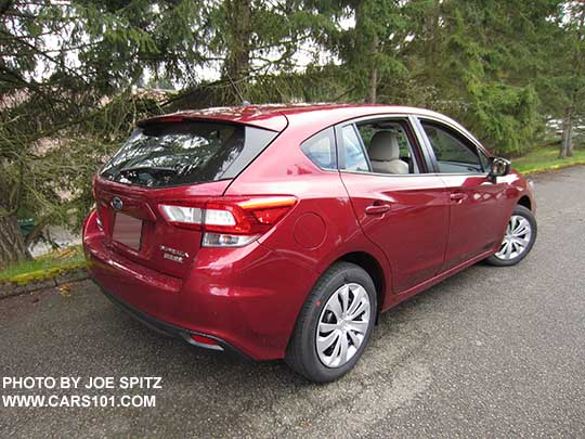 2107 Subaru Impreza 2.0i base model 5 door hatchback, venetian red color shown