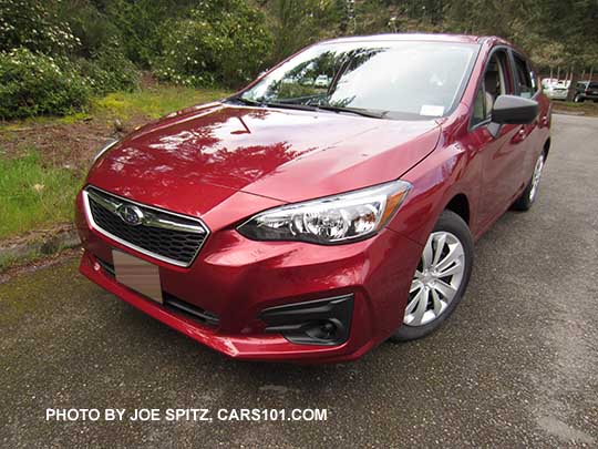 2017 Subaru 2.0i Impreza 5 door hatchback base model venetian red color.