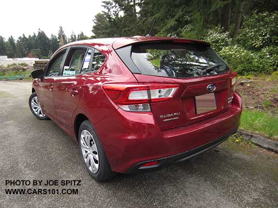 rear view 2017 Subaru 2.0i Impreza 5 door hatchback base model venetian red color. No roof rack rails.