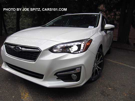 2017 Subaru Impreza Limited 5 door hatchback, silver fog light trim. Crystal White.