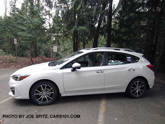 2017 Subaru Impreza Limited 5 door hatchback, 17" alloys, silver roof rails and door handles. Crystal White