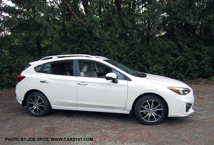 2017 Subaru Impreza Limited 5 door hatchback, 17" alloys, silver roof rack rack rails and door handles. Crystal White