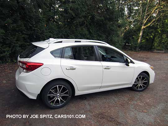2017 Subaru Impreza Limited 5 door hatchback, 17" alloys, silver roof rack rails and door handles. Crystal White