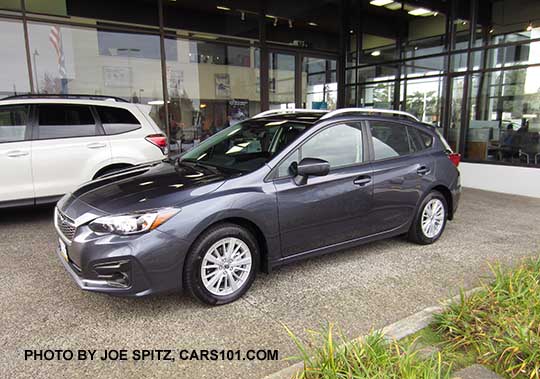 2017 Subaru Impreza Premium 5 door hatchback, 16" silver alloys, silver roof rack rails. Carbide Gray Metallic color shown.