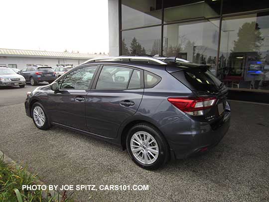 2017 Subaru Impreza Premium 5 door hatchback, 16" silver alloys, silver roof rack rails. Carbide Gray Metallic color shown.