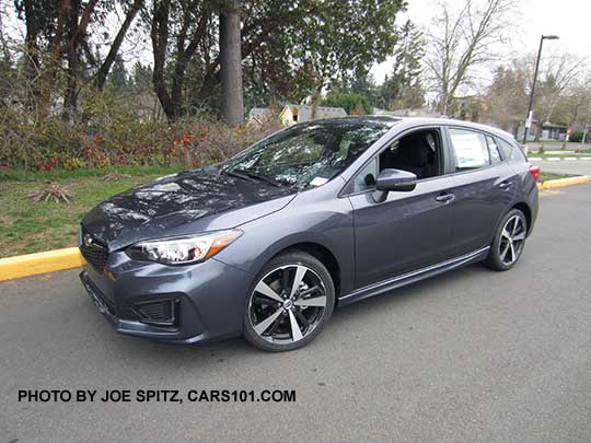 side view 2017 Subaru Impreza Sport 5 door hatchback, 18" alloys. Carbide Gray Metallic color shown.