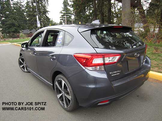 rear view side view 2017 Subaru Impreza Sport 5 door hatchback, 18" alloys. Carbide Gray Metallic color shown.