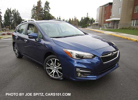 2017 Subaru Impreza Limited 5 door hatchback has silver roof rack rails, silver door handles, silver fog light trim,  17" machined alloys. Lapis blue color.