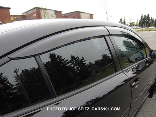 2017 Subaru Impreza optional dealer installed side window drip molding, on a 4 door sedan. Shown with aftermarket dark tinted windows.