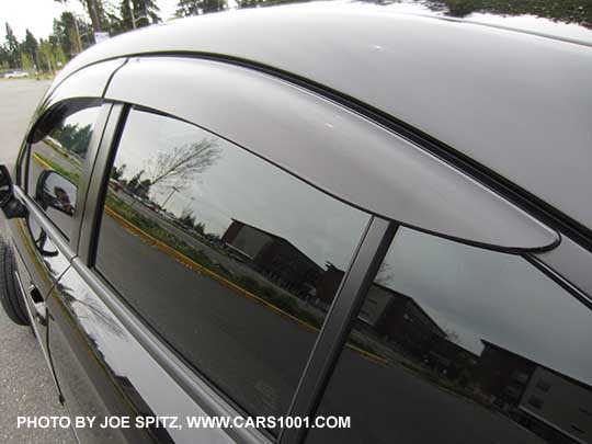 2017 Subaru Impreza optional dealer installed side window drip molding on a 4 door sedan. Shown with aftermarket dark tinted windows.