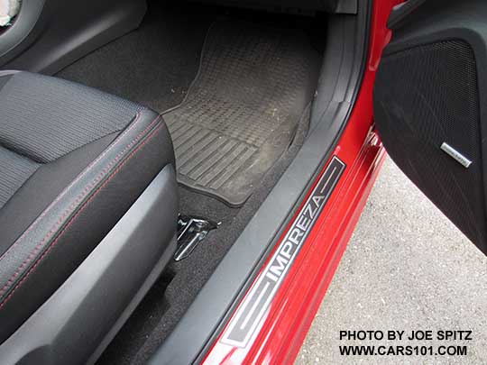 2017 Subaru Impreza optional door sill plates. Set of 4.  Passenger door shown, also with optional all weather floor mats. Lithium Red Sport model shown.