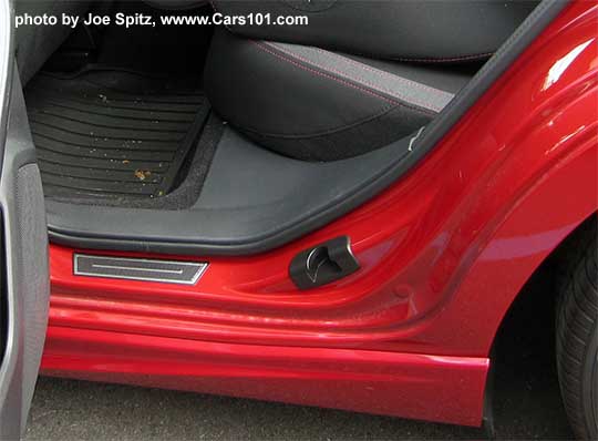 2017 Subaru Impreza optional door sill plates. Set of 4. Rear door shown, also with optional all weather floor mats. Lithium Red Sport model shown.