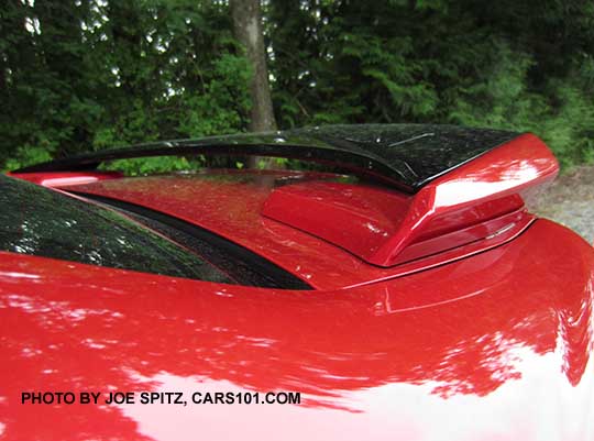 closeup of the 2017 Subaru Impreza Sport 4 door sedan rear trunk spoiler with body colored ends and gloss black body