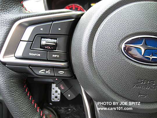 2017 Subaru Impreza Sport leather wrapped, red stiched steering wheel audio, bluetooth cell, and info screen controls