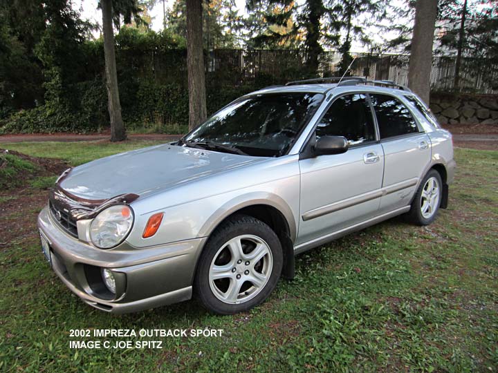 2002 silver impreza Outback Sport