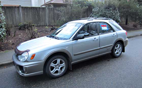 side view silver 2002 subaru outback sport impreza