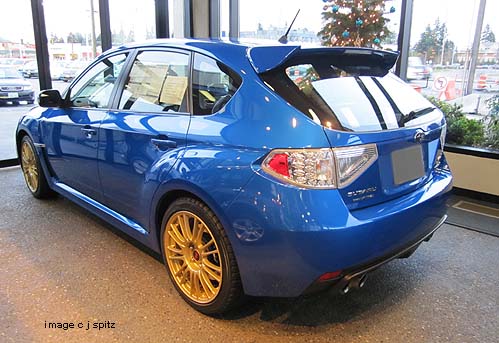 blue wrx sti 5  door with gold bbs alloy wheels