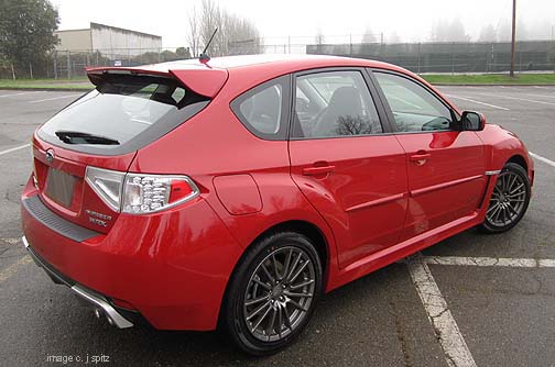 2011 WRX wagon lightning red optional body side moldings, rear bumper cover, exhaust finishers