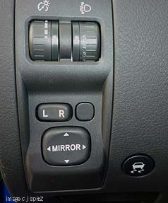 2010 Subaru STI controls by drivers left knee