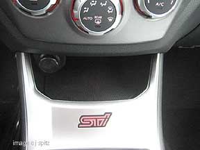 2010 STI illuminated logo on center console