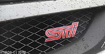 2010 STI logo on front grill