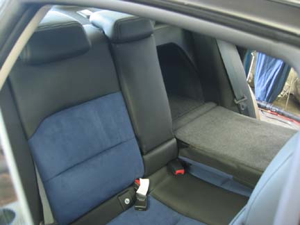 rear seats fold down in a Legacy sedan