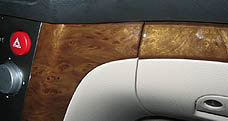 Elm Wood trim with taupe leather interior
