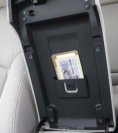 2010 legacy armrest storage slot for parking passes, tickets etc