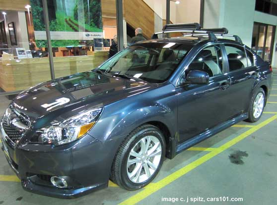 29013 subaru legacy sedan with subaru crossbars. dealer installed only