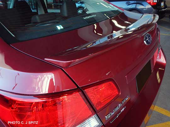 2013 venetian red subaru legacy with optional rear spoiler