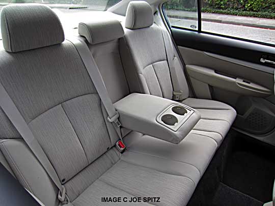 2014 subaru legacy rear seat with armrest/cupholder. warm ivory beige cloth shown