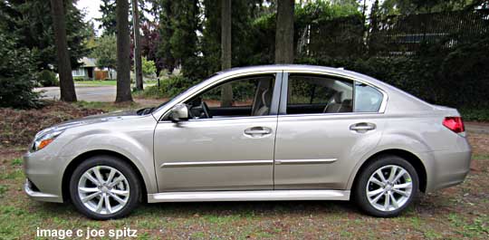 2014 subaru legacy sedan with optional bodyside moldings, tunsten metallic color shown