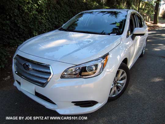 front of a crystal white 2015 Legacy