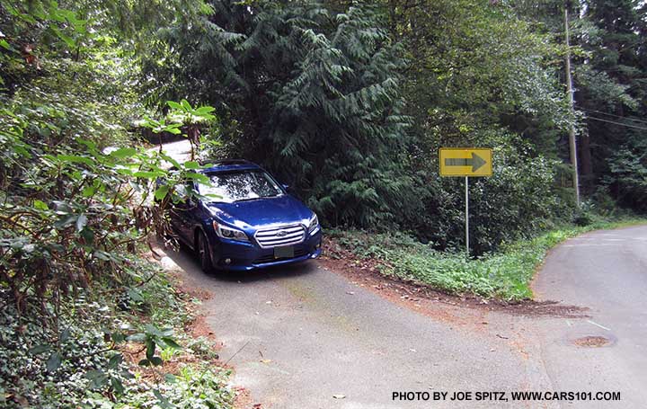 2015 Subaru Legacy coming down the driveway, lapis blue color shown