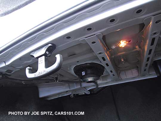 one of the two 2016 Legacy optional flip up/down cargo hooks in the trunk, notice the trunk light, and the underside of the harman/kardon rear shelf speaker