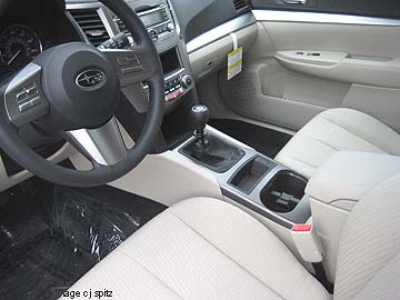 2.5i model with manual transmission, ivory interior shown